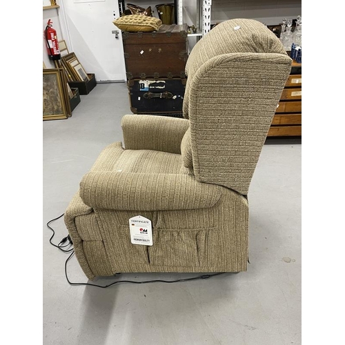 39 - Electric reclining armchair, beige upholstery.