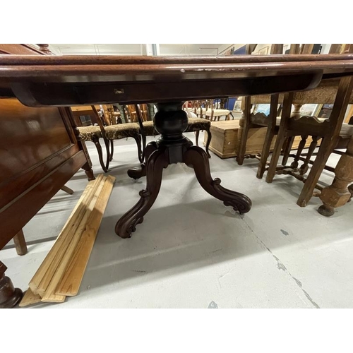 41 - Early 20th cent. Mahogany rectangular tilt top dining table on turned central support with tripod fe... 