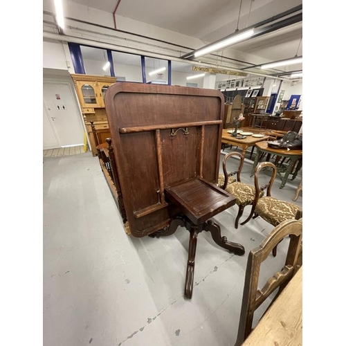 41 - Early 20th cent. Mahogany rectangular tilt top dining table on turned central support with tripod fe... 