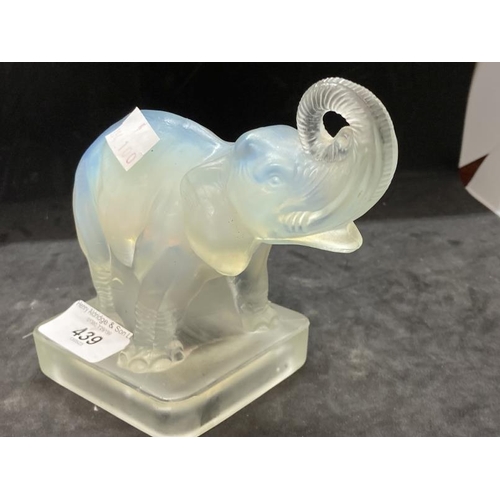 439 - The Mavis and John Wareham Collection: Jobling Art Glass: Opalescent elephant with raised trunk on o... 