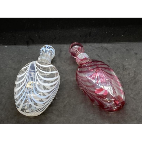 445 - Glass: Venetian banded pocket flask pink, plus one other, white. (2)