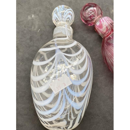 445 - Glass: Venetian banded pocket flask pink, plus one other, white. (2)