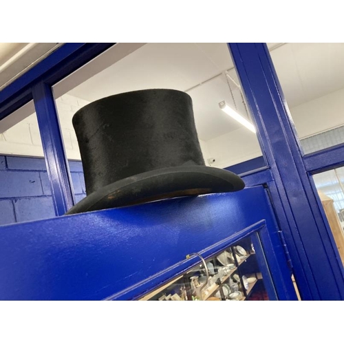 452 - Early 20th cent. Small adult's top hat and tails, the hat labelled G.W.K of York.