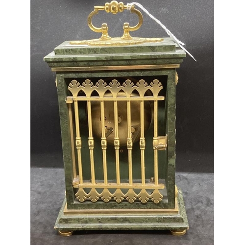 456 - Clocks: French Empire style Le Castel mantel clock, malachite style case with gilt metal mounts on a... 