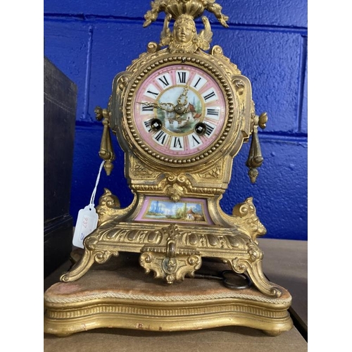 458 - French Louis XIV style gilt metal mantle clock, circular painted porcelain dial in a cylinder case s... 