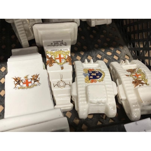 476 - Commemorative: Collection of WWI ceramic tanks and models of The Cenotaph, two A/F. (8)