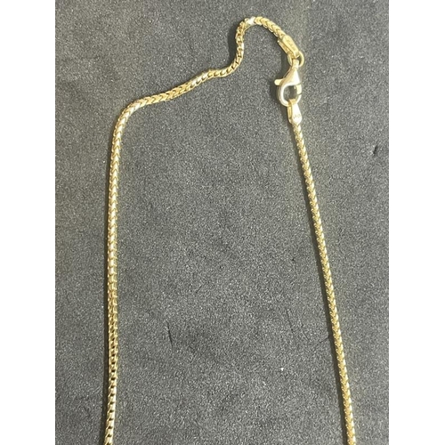 566A - Jewellery: Yellow metal curb link chain, tests as 18ct gold. Length 16ins. Plus a coin mount A/F.