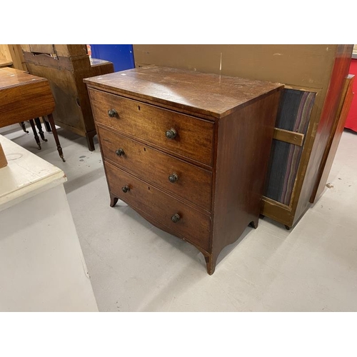 67 - 19th cent. Mahogany chest of three long drawers on splayed bracket feet, with brass lion head handle... 