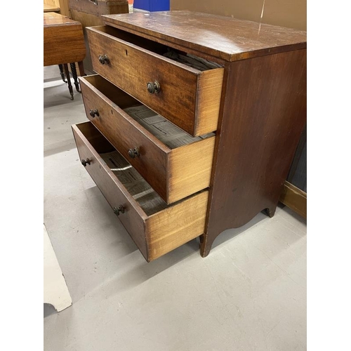 67 - 19th cent. Mahogany chest of three long drawers on splayed bracket feet, with brass lion head handle... 