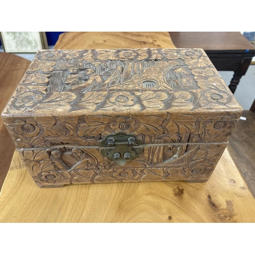 79 - 20th cent. Carved camphor wood marriage chest with sliding tray. Approx. 40ins. x 21ins. x 22ins. Pl... 