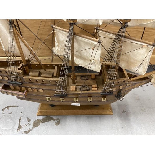 86 - Models: Treen ships - four masted brig approx. 20ins, and galleon approx. 18ins. (2)