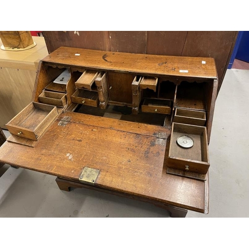 87 - 18th cent. Figured oak drop well bureau, two short over two long drawers with drop handles, the insi... 