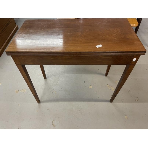 95 - 19th cent. Mahogany tea table, the rectangular top with reeded edge on squared tapered legs. 34ins. ... 