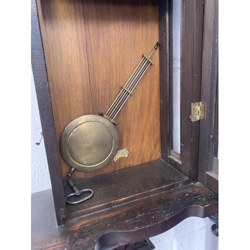 120 - Clocks: Art Nouveau regulator with brass face and stylised spandrels. 43ins.