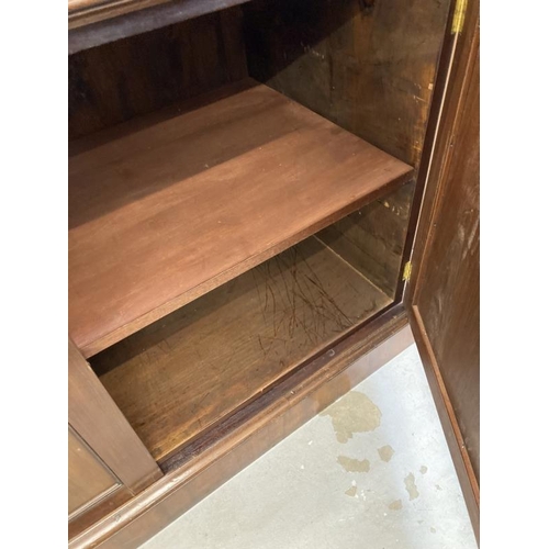 128 - 19th cent. Mahogany breakfront bookcase four Astragal glazed top cupboards, four enclosed base cupbo... 