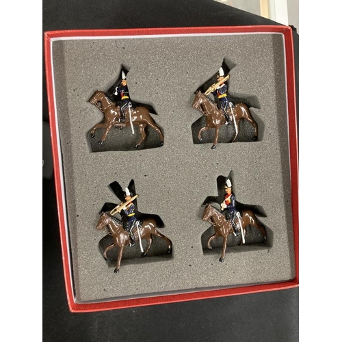 242 - Toys & Games: Hollow cast Britain's set 40191 9th Lancers Mounted Band (1 lancer missing), plus 5392... 