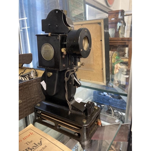 1920s Pathe Baby Projector and a large quantity of film reels of
