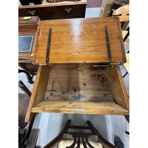 37 - 20th cent. Child's weathered pine school flip top desk, a pair.