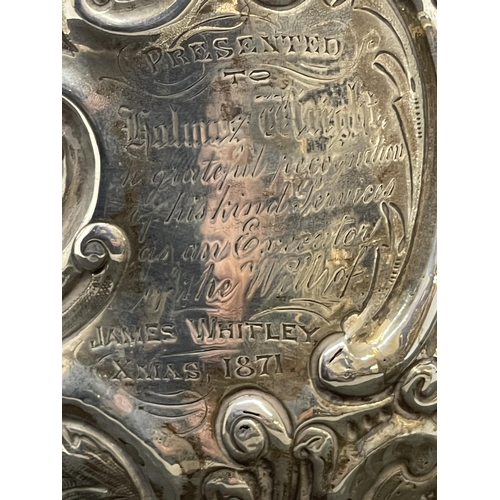 395 - Silver & Plated Ware: George III white metal lidded jug with embossed floral decoration and having a... 