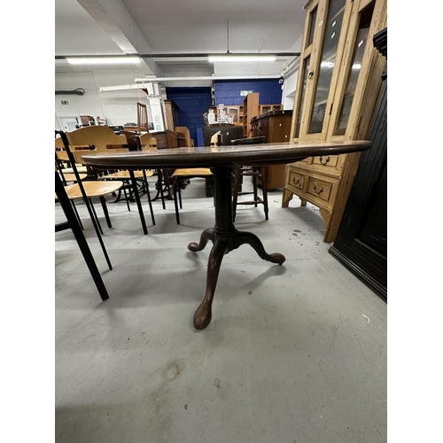 46 - 19th cent. Mahogany tilt top dining table on gun barrel supports, tripod club feet.