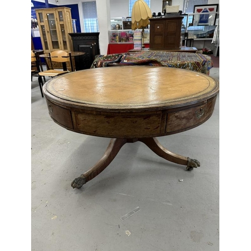 47 - 19th/20th cent. Mahogany drum table on column support terminating in brass claw feet and castors.