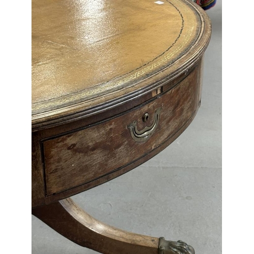 47 - 19th/20th cent. Mahogany drum table on column support terminating in brass claw feet and castors.