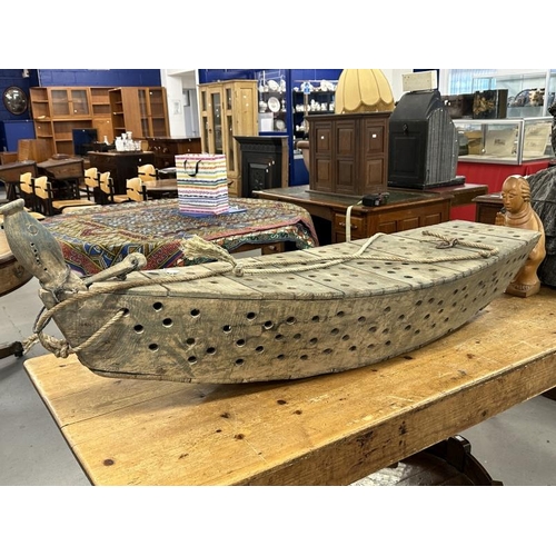 58 - Early 20th cent. Treen fisherman's catch boat in the form of a boat, likely from the Gironde area of... 