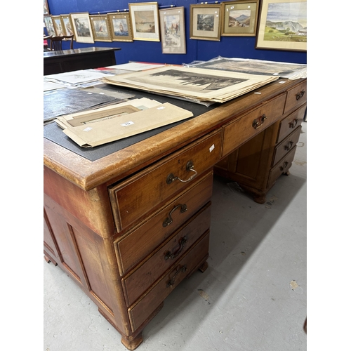 64 - 19th cent. Mahogany stained nine drawer twin pedestal desk with brass drop handles. Approx. 66ins. x... 