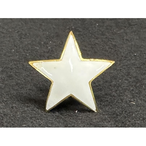 264 - WHITE STAR LINE: Incredibly rare, gilt and white enamelled lapel badge in the form of a five-pointed... 