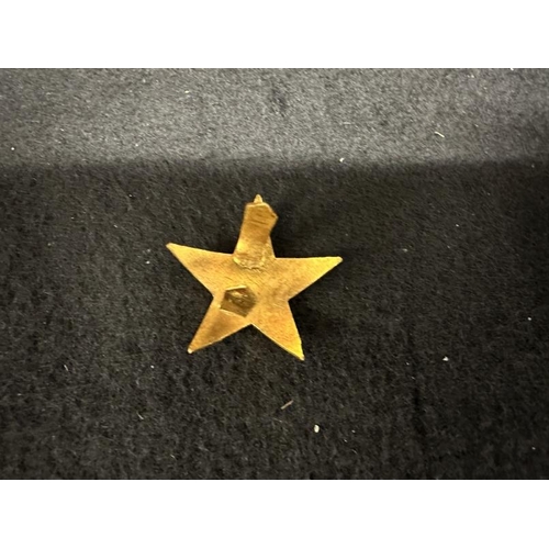 264 - WHITE STAR LINE: Incredibly rare, gilt and white enamelled lapel badge in the form of a five-pointed... 