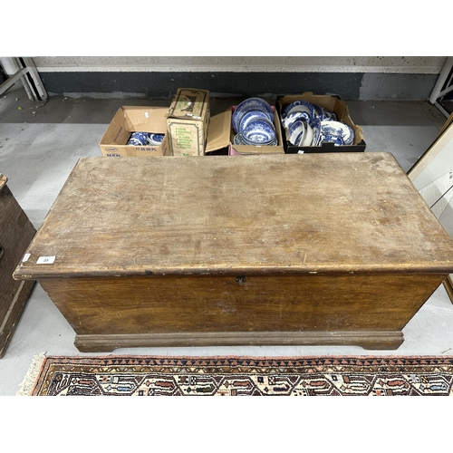 23 - 19th cent. Pine blanket box with candle compartment, iron handles, and bracket feet. 40ins. x 19ins.... 