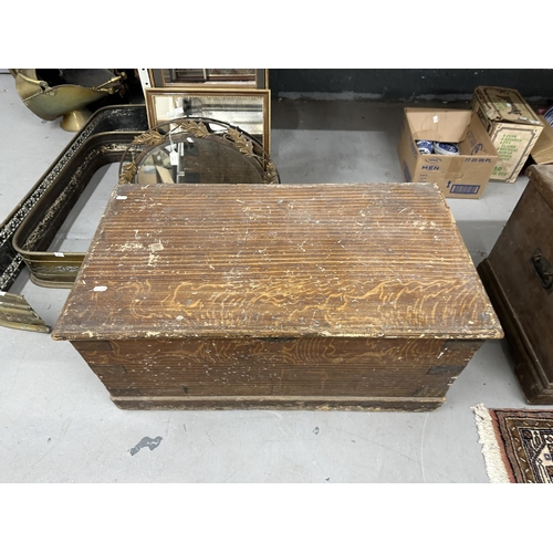 23 - 19th cent. Pine blanket box with candle compartment, iron handles, and bracket feet. 40ins. x 19ins.... 