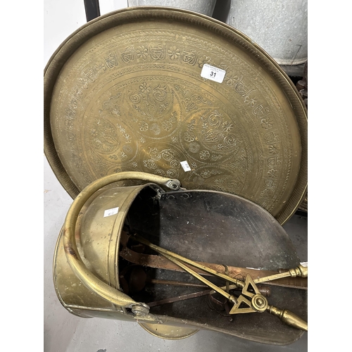 31 - Brass and other metalware including coal scuttle, pot, plates, griddles, candlesticks, fire furnitur... 