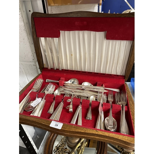 34 - Elkington 77-piece silver plated flatware with plain pine handles in a canteen.