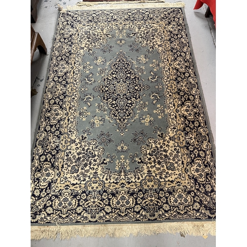 44 - Rugs/Carpets: 20th cent. Kashgar or S.W. Chinese, blue ground with a central Gul decorated with flor... 