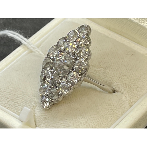 474 - Jewellery: Early 20th cent. Marquise cut graduated diamond ring. The ring and mount test as platinum... 