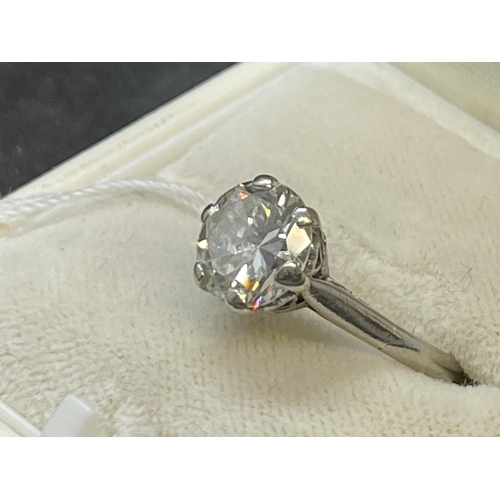 477 - Jewellery: White metal ring claw set with a brilliant cut diamond, estimated weight 2.50ct, colour H... 