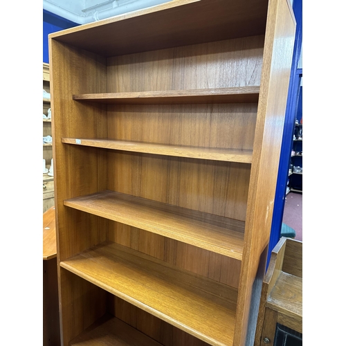 50 - Mid 20th cent. G-Plan teak effect bookcase with five shelves. 6ft. x 32ins. x 11ins. Plus a G-Plan t... 