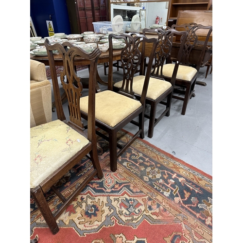 53 - 19th cent. Mahogany harlequin set of four dining chairs with carved splat backs.