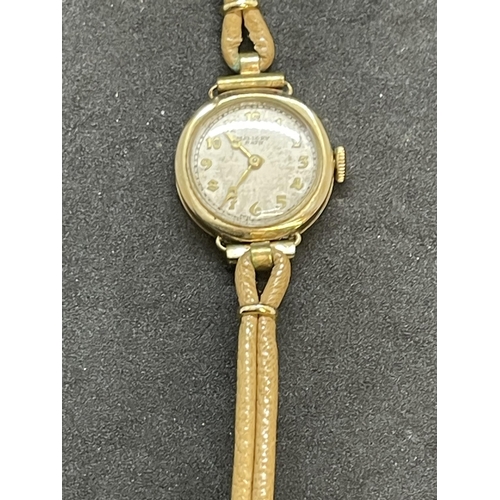 556 - Watches: Hallmarked ladies 9ct gold Mallory of Bath wristwatch, ivory coloured dial with Arabic nume... 