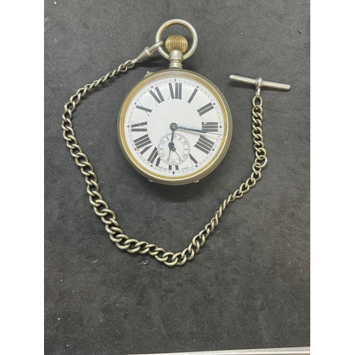 560 - Watches: Large 'Goliath' pocket watch and Albert chain, with silver T bar.