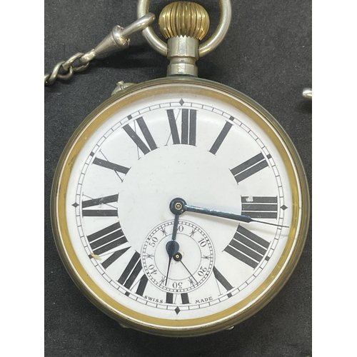 560 - Watches: Large 'Goliath' pocket watch and Albert chain, with silver T bar.