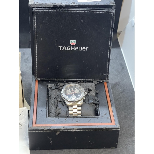 564 - Watches: Tag Heuer Appro 2000 Classic, black face, with box, paperwork and original receipt from Gol... 