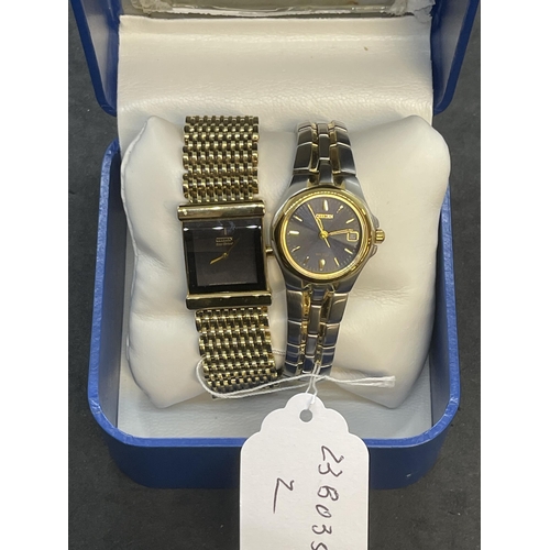 565 - Watches: Ladies Citizen bracelet watches, one with a blue round dial the other with a square black d... 