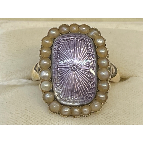 575 - 18ct Victorian mourning rectangular ring 21.5mm x 17.5mm with a lilac coloured enamelled centre surr... 