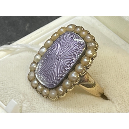 575 - 18ct Victorian mourning rectangular ring 21.5mm x 17.5mm with a lilac coloured enamelled centre surr... 