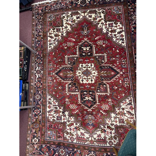 578 - 20th cent. Caucasian carpet, possibly Kazak, red ground with one central Gul, segmented greens, four... 