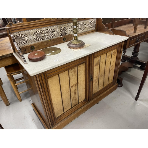 65 - Burr maple marble topped washstand with Minton style tiled splashback. 46ins. x 20ins. x 41ins.... 