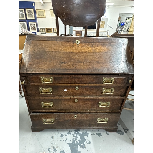 66 - 18th cent. Oak bureau, fall front, fitted interior over four drawers, on bracket supports. Original ... 