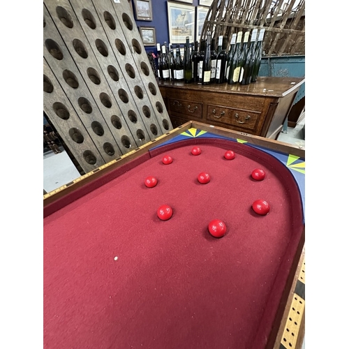 109 - Games: Early 19th cent. Mahogany cased Bagatelle game board on base with original crystalline balls.... 